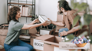 A couple organizing boxes and decluttering their home for Mother’s Day storage solutions